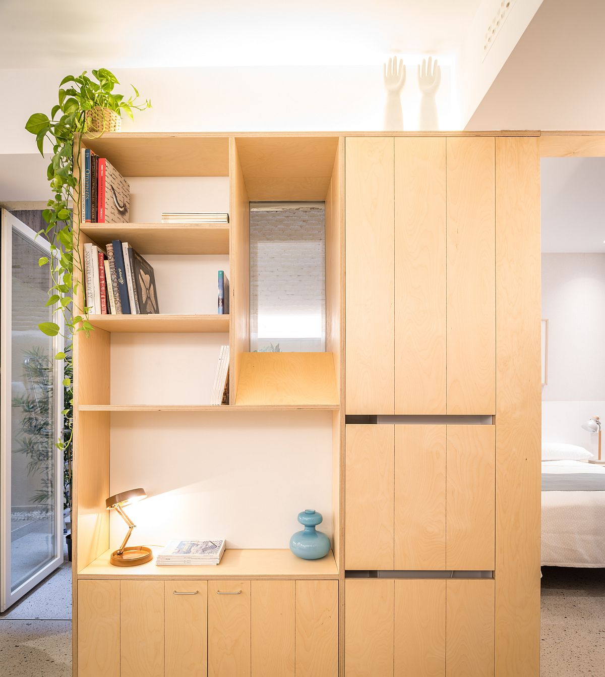 Birch plywood decor throughout the apartments add warmth to an otherwise neutral space