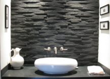 Black-slate-is-used-to-shape-both-the-backsplash-and-the-vanity-in-this-small-modern-bathroom-217x155
