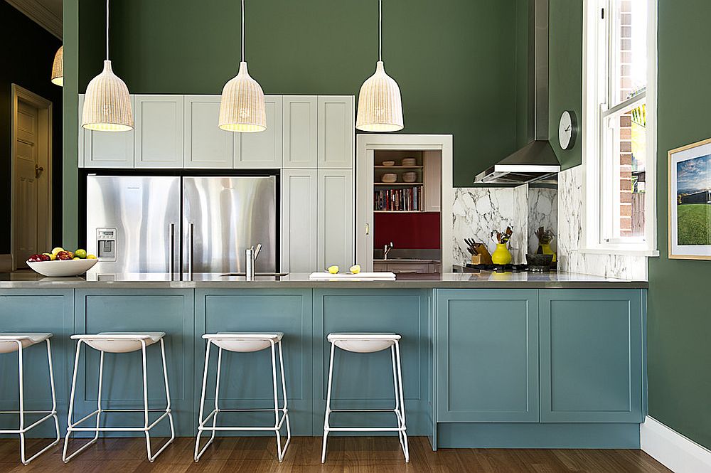 Blend of dark green and blue in the kitchen creates a picture of class and elegance