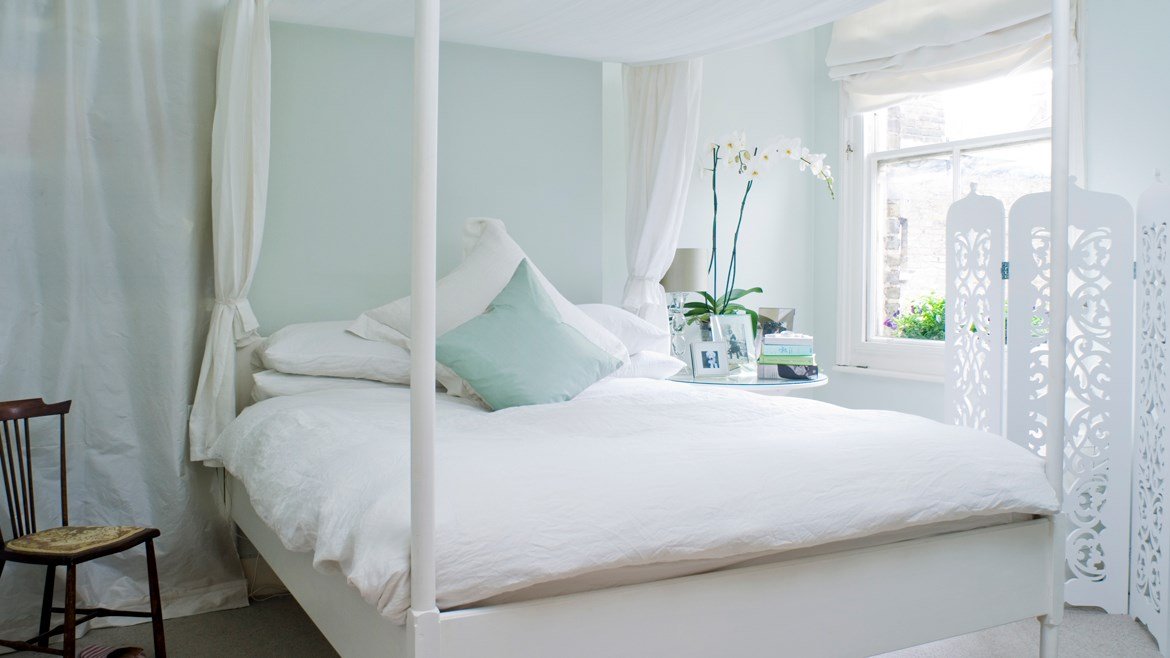 Breezy bedroom featuring paint from Farrow & Ball