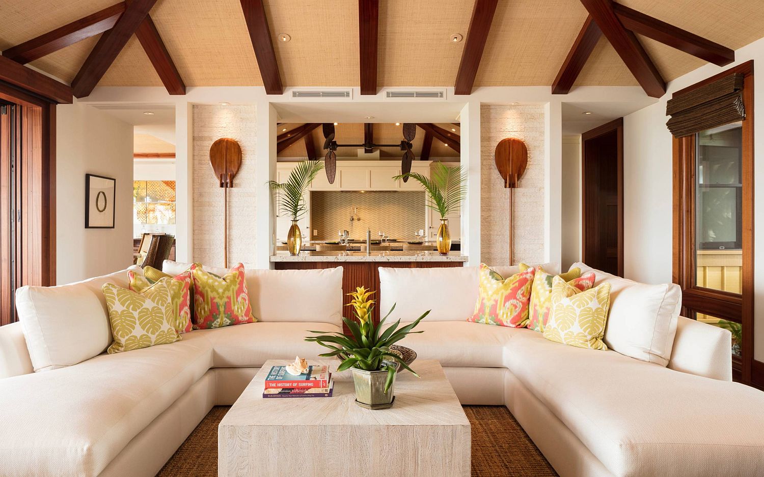 Brown ceiling and white curved couch for the living room