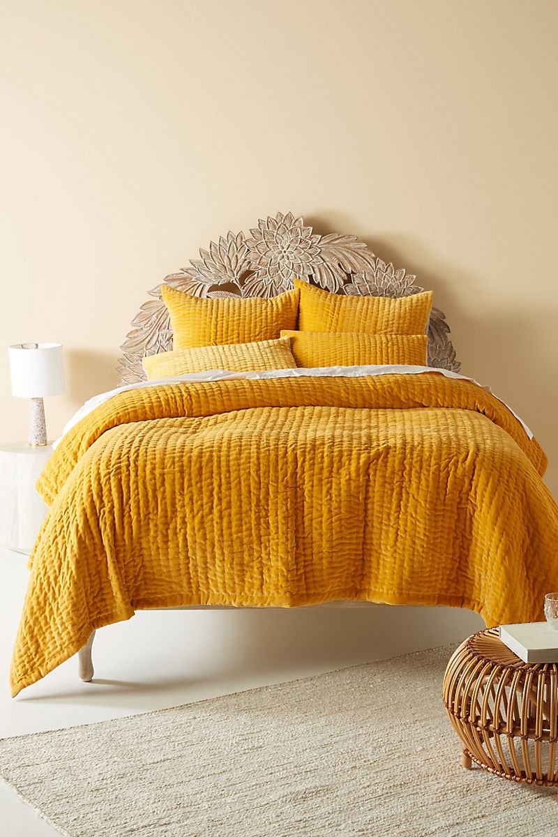 Buttery bedroom paint in a space by Anthropologie