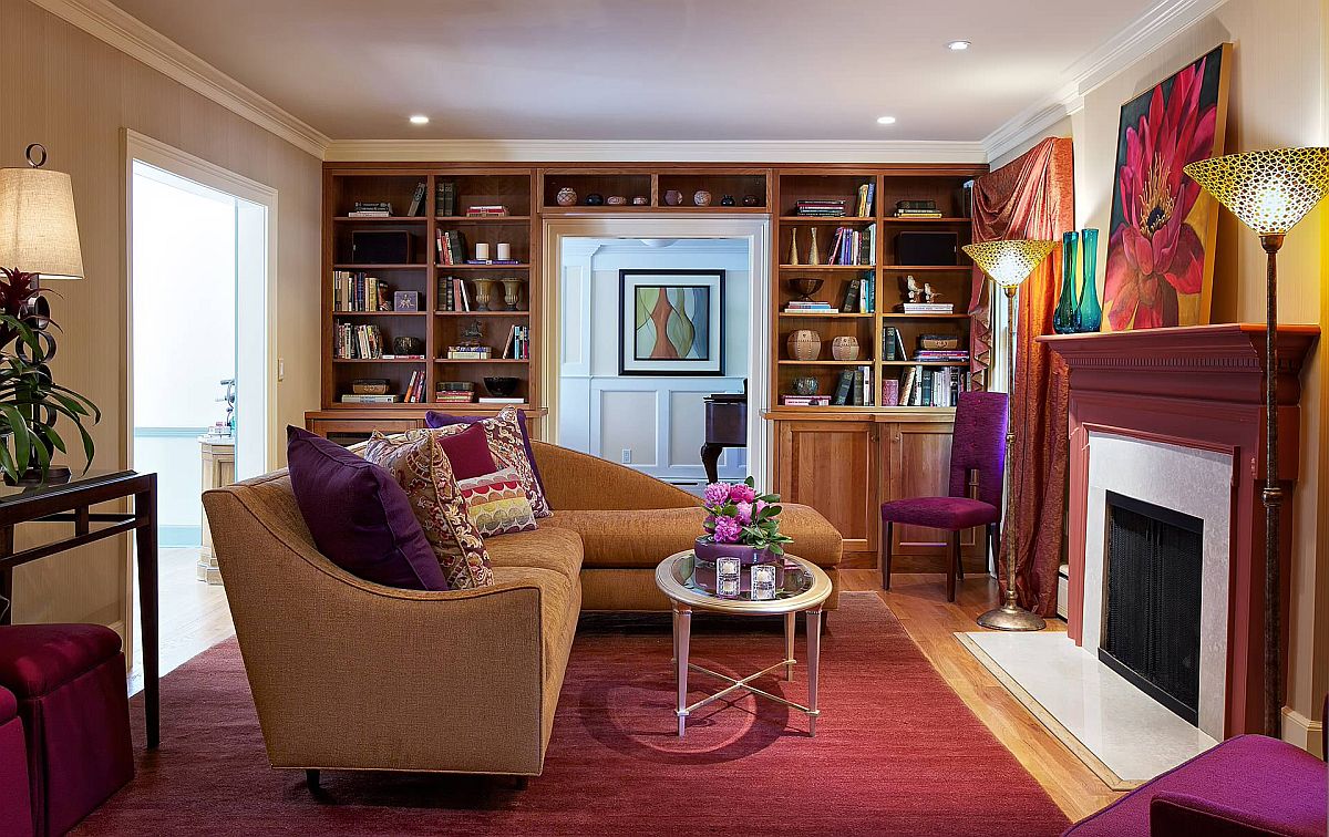 Colorful-eclectic-living-room-of-New-York-home-with-shelves-wrapped-around-the-doorway