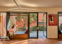 Comfortable-interior-of-the-studio-in-brick-and-glass-217x155