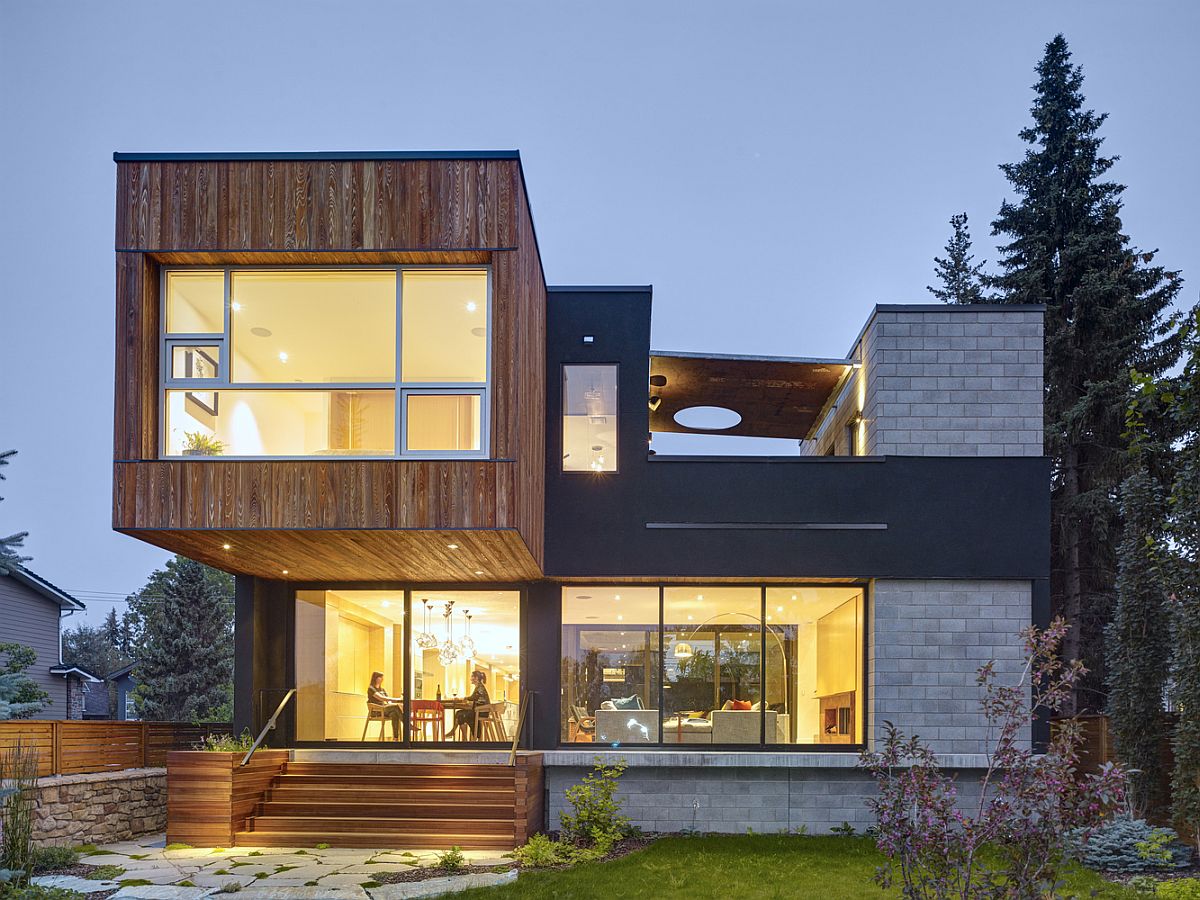 Contemporary home in Calgary with wooden front along with cement block walls