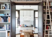 Doorway-with-built-in-shelves-around-it-delineates-the-kitchen-and-the-doorway-217x155