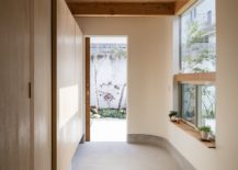 Entry-and-Japanese-room-welcome-guests-at-this-narrow-home-that-is-space-savvy-and-eco-friendly-217x155