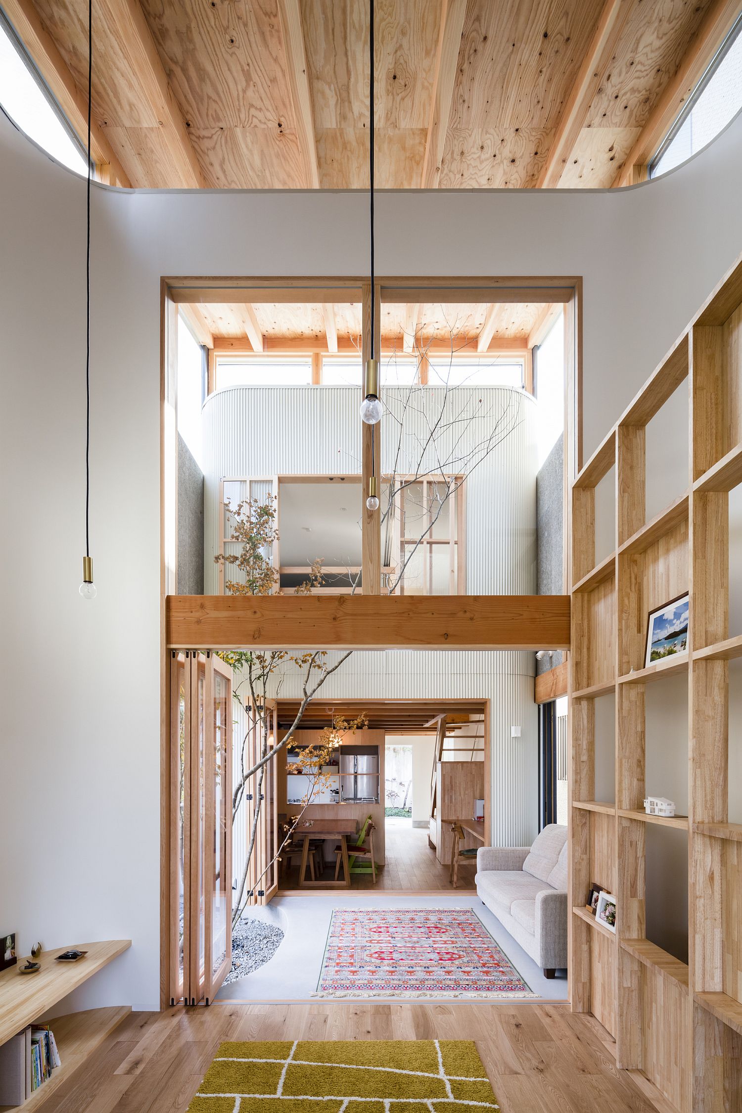 Fabulous Japanese home in white and wood with a breezy, double-height interior