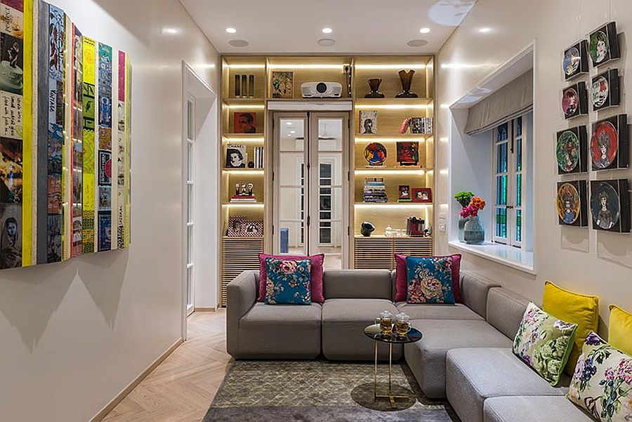 Finding space around the doorway for gorgeous shelving along with fabulous lighting