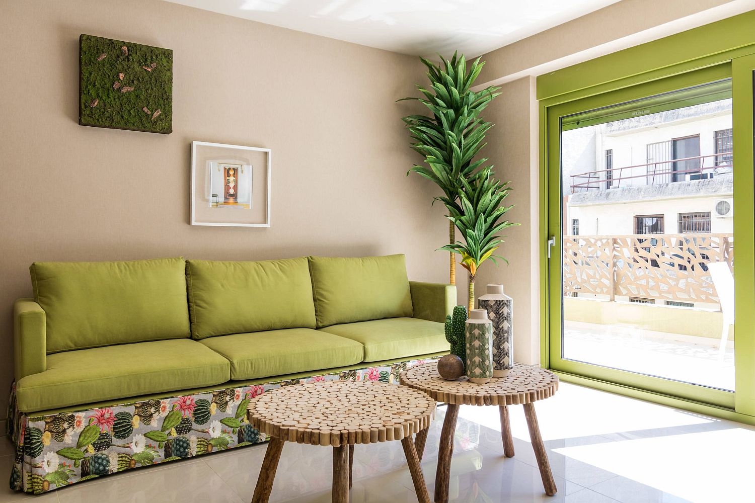 Giving the small living room color using pops of green