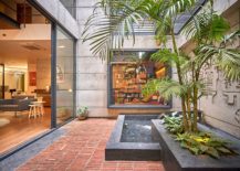 Green-area-coupled-with-water-feature-in-the-central-courtyard-217x155