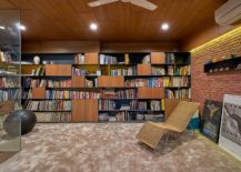 Library-in-brick-concrete-and-wood-with-ample-shelf-space-217x155