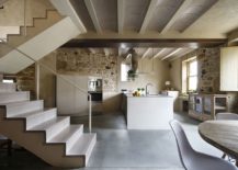 Lower-level-open-plan-living-area-with-stone-walls-217x155