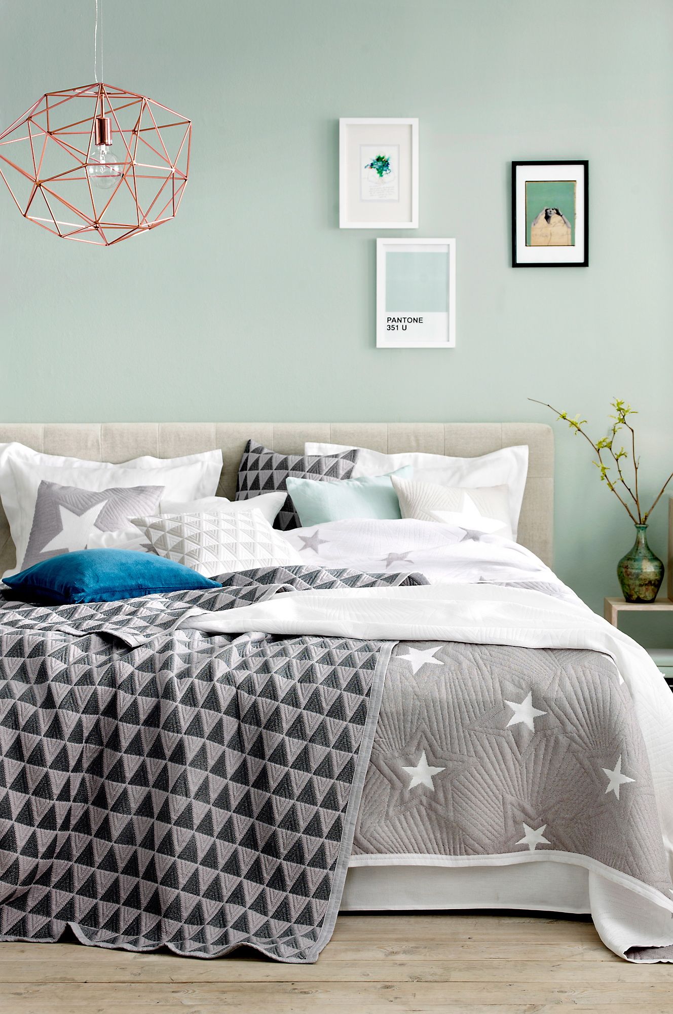 Mint green bedroom with modern fabrics