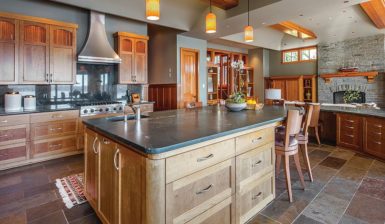 Modern Rustic Kitchen With An Island That Has Ample Cabinets And Drawers Providing Multiple Storage Options 385x224 