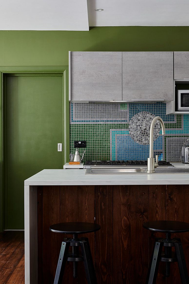 Multi-colored-kitchen-with-tiled-backsplash-woodsy-island-and-plenty-of-green