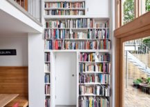 Multi-level-living-room-library-wall-in-white-steals-the-show-in-this-house-217x155