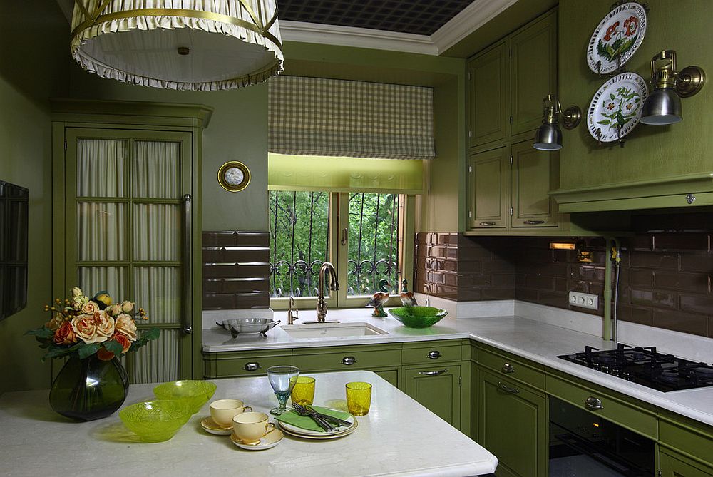 Patterned ceiling, dark green cabinets and white countertops create a country style kitchen