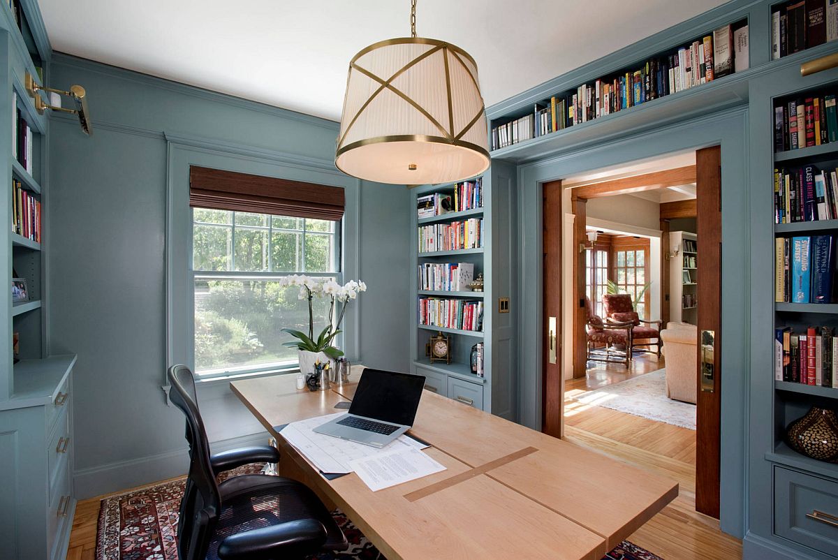 Shelves wrapped around the doorway are a smart and space-savvy idea in the modern home office