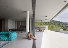 Sliding-glass-doors-delineate-the-living-area-from-the-deck-and-pool-easily-217x155