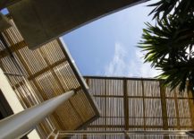 Smart-placement-of-moving-bamboo-shades-inside-the-Kalim-Beach-House-217x155