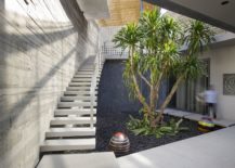 Staircase-leading-to-the-living-areas-and-courtyard-on-the-lower-level-217x155