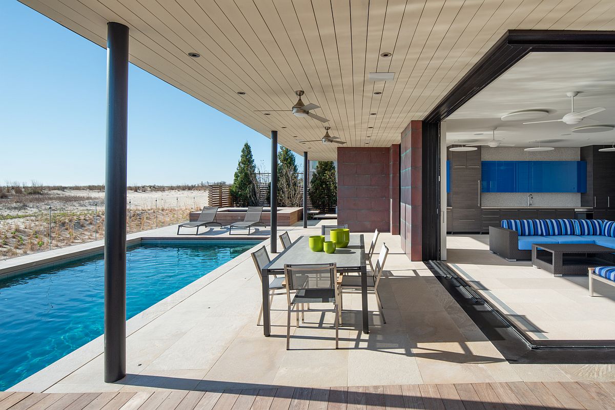 Swimming pool sits next to the beach and offers wonderful views