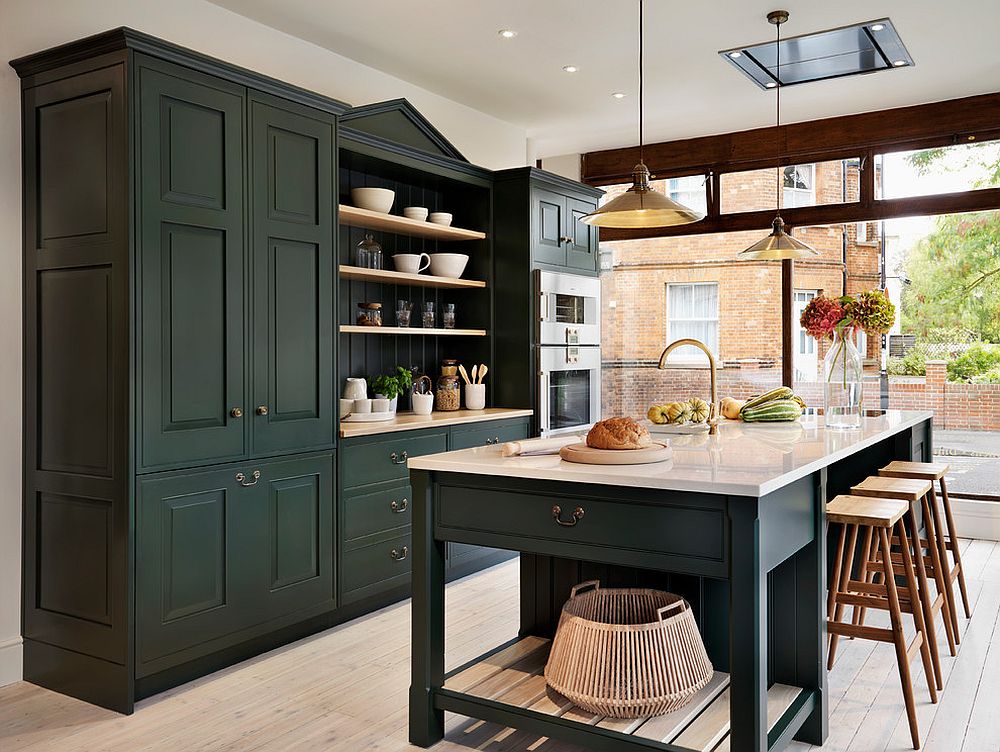 Traditional kitchen with dark cabinets and ample naural light