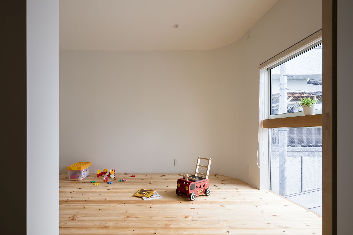 Upper level play room of the Melt House with ample natural light