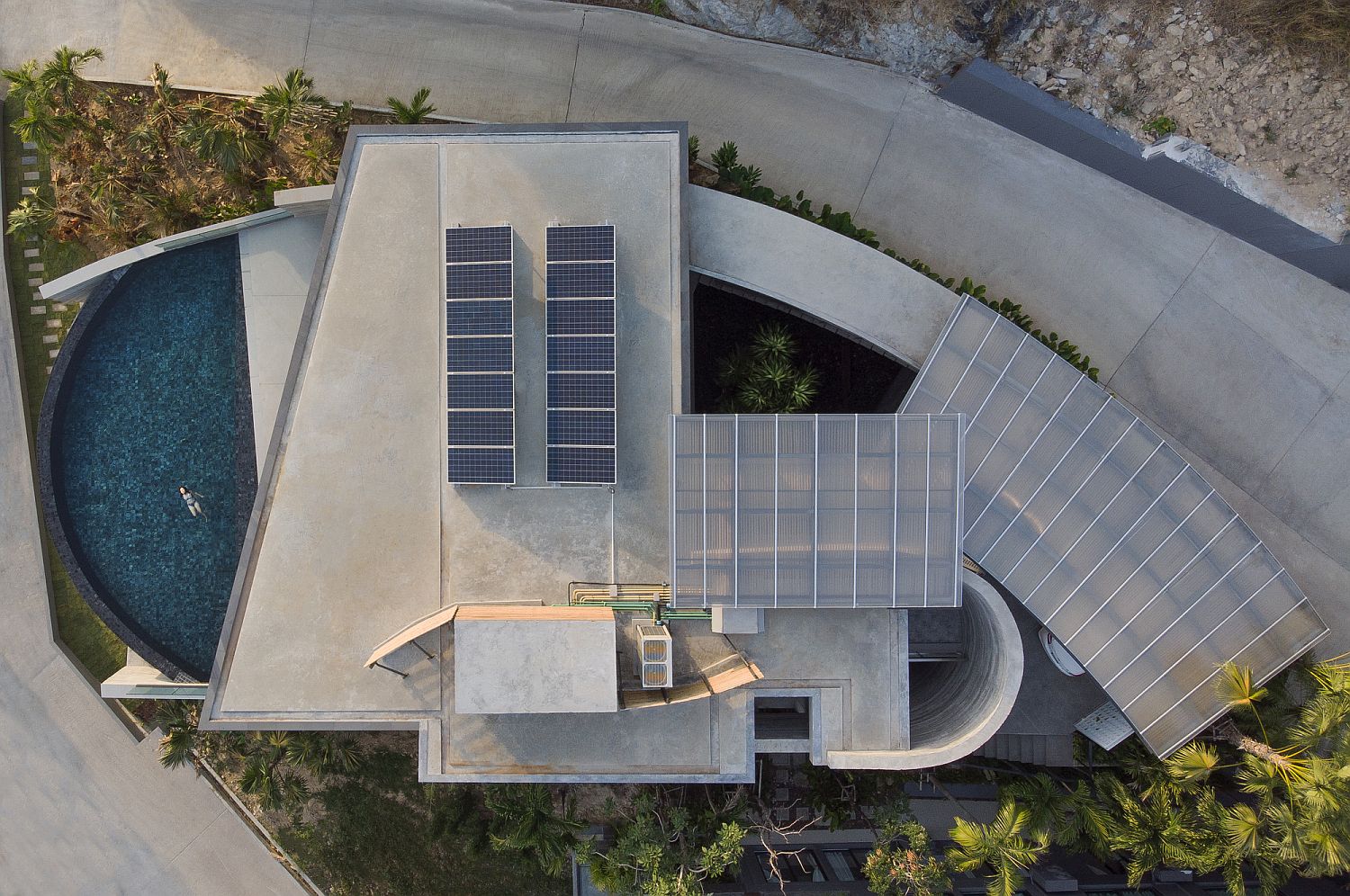 View from the sky of the Kalim Beach House powered by solar panels