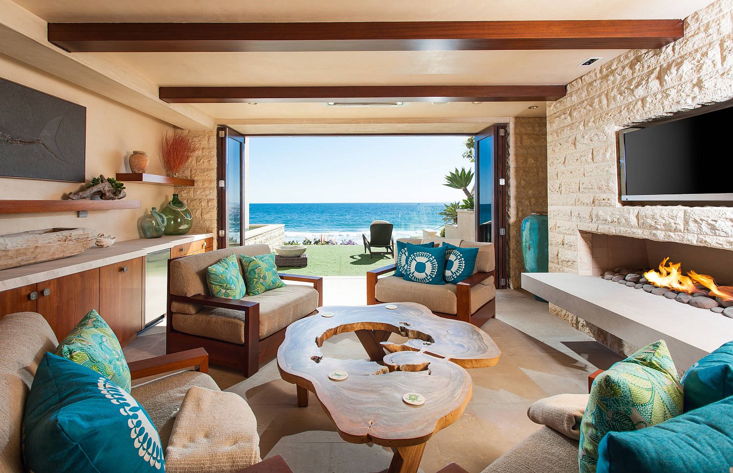 View of the ocean from the tropical style living room