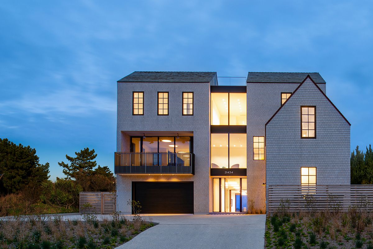 Warm lighting illuminates the vacation house after sunset