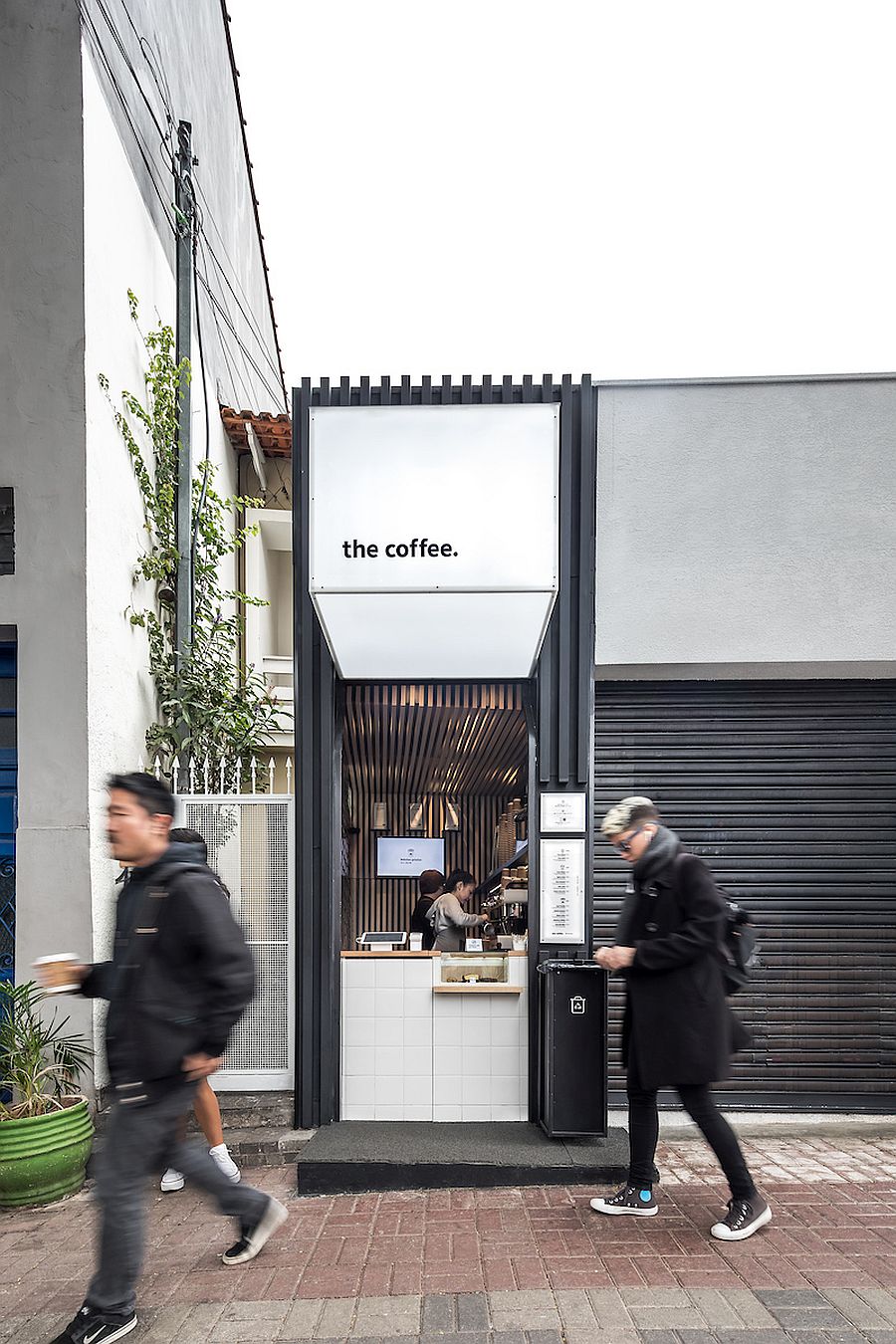 White-coffee-shop-exterior-with-black-thrown-into-the-mix