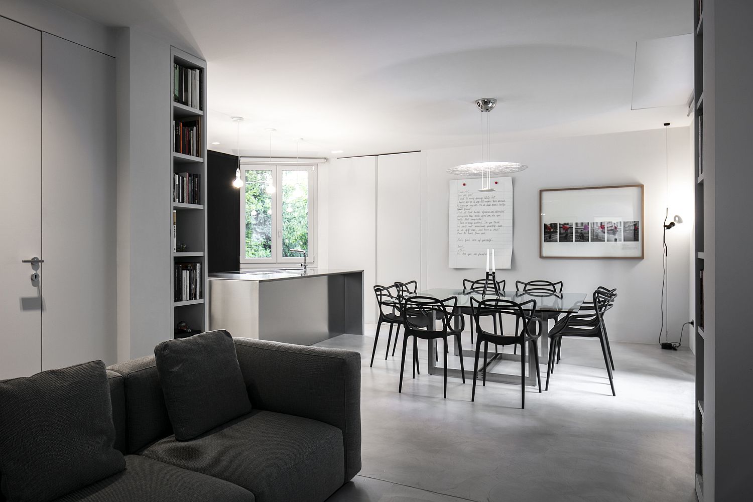 White, shades of gray and black combined to create a fabulous contemporary living room