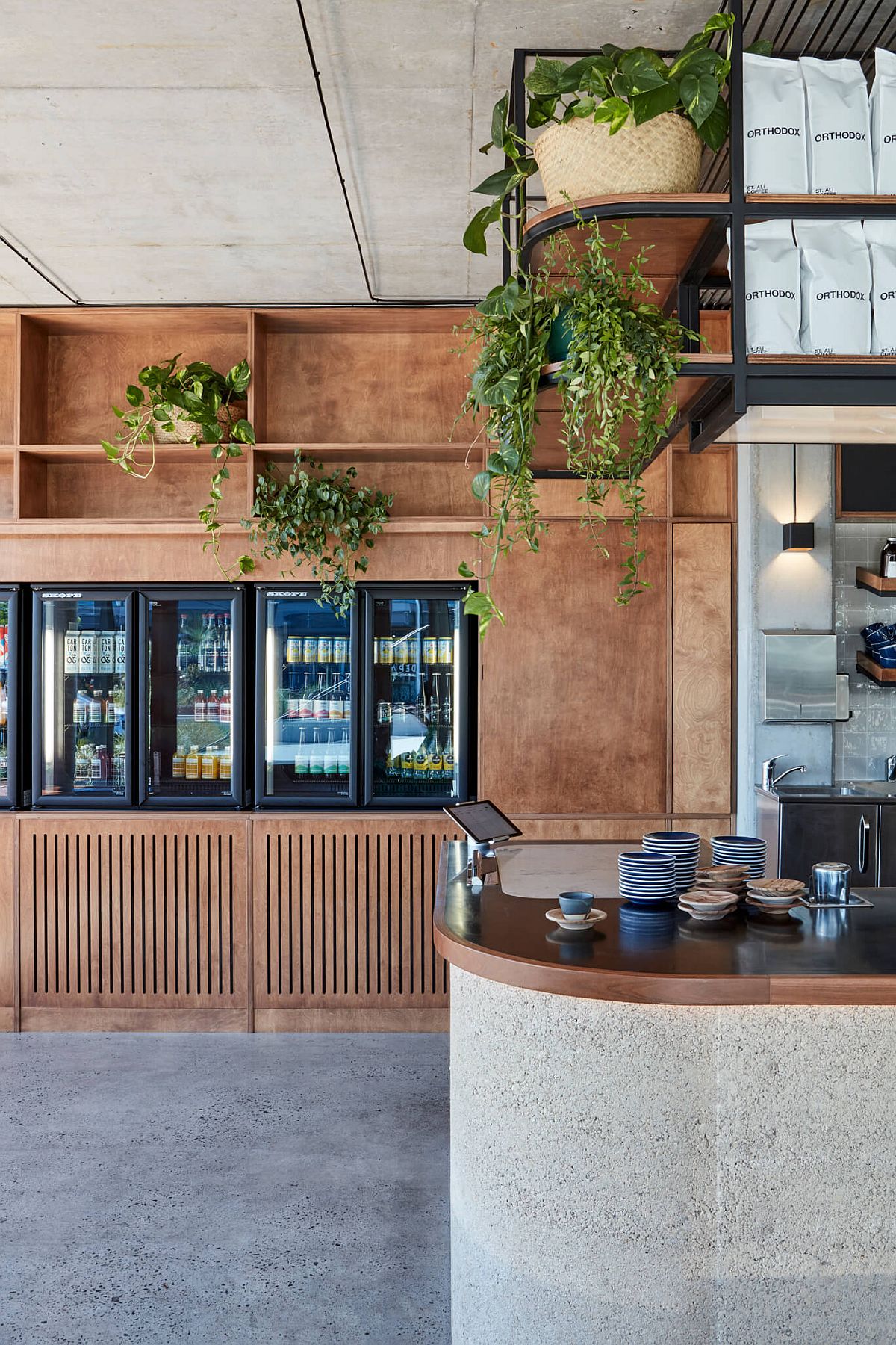 25-meter long bar for the new restaurant feels both organic and low-key