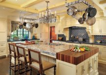 Add-the-butcher-block-to-the-large-kitchen-island-with-stone-countertop-and-ample-shelf-space-31450-217x155