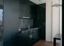 Black-cabinets-backsplash-and-appliances-create-monochromatic-single-wall-kitchen-66641-217x155
