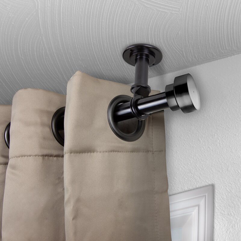 Black curtain rod with finial caps