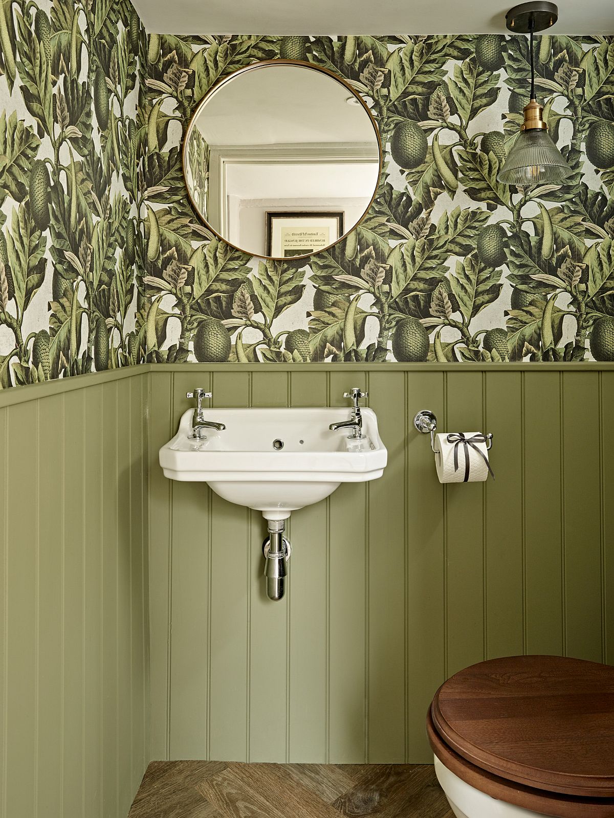 Both-wallpaper-and-light-green-wall-add-color-and-class-to-the-small-farmhouse-powder-room-with-wall-mounted-sink-73735