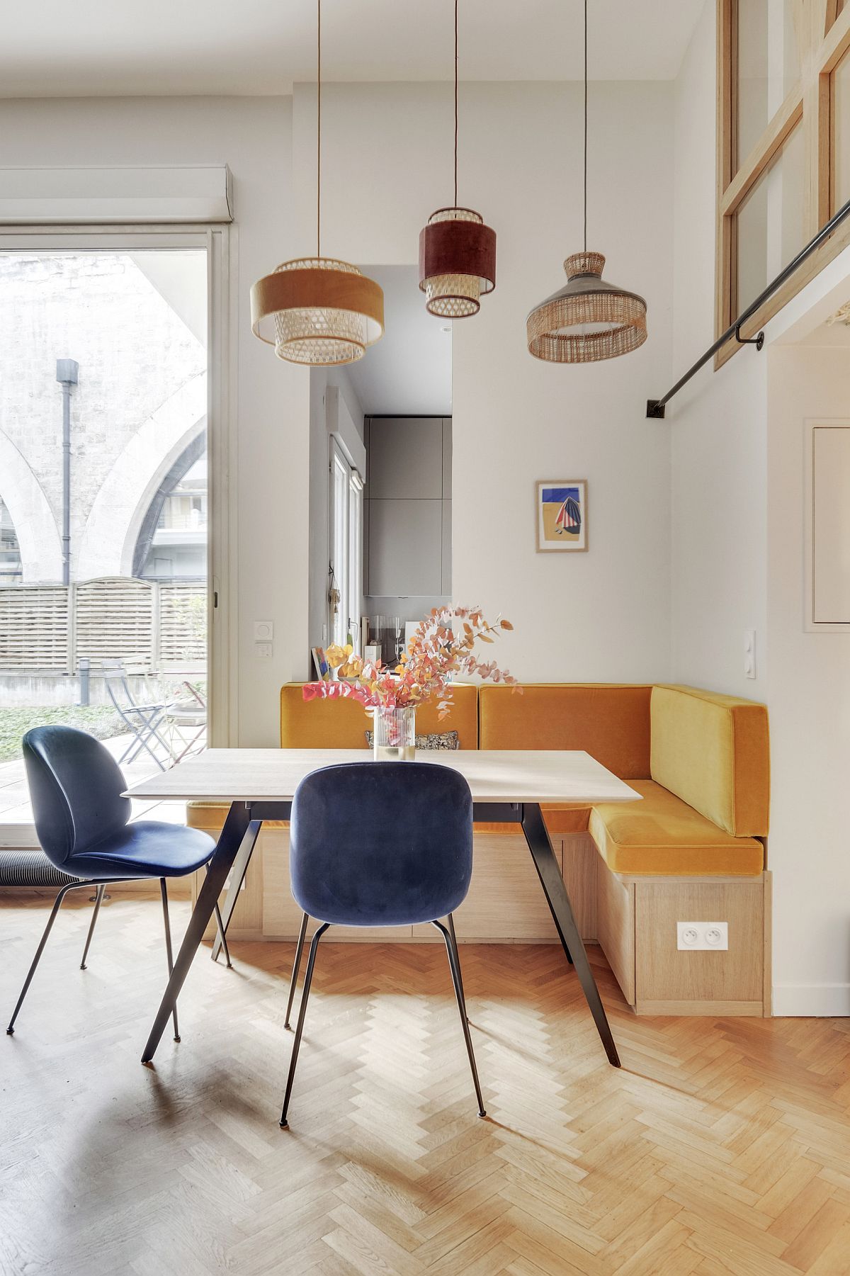 Corner banquette seating for the small Scandinavian style dining room