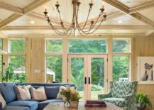 Dashing-traditional-sunroom-with-woodsy-walls-and-ceiling-where-the-sofa-brings-in-a-splash-of-blue-13157-217x155