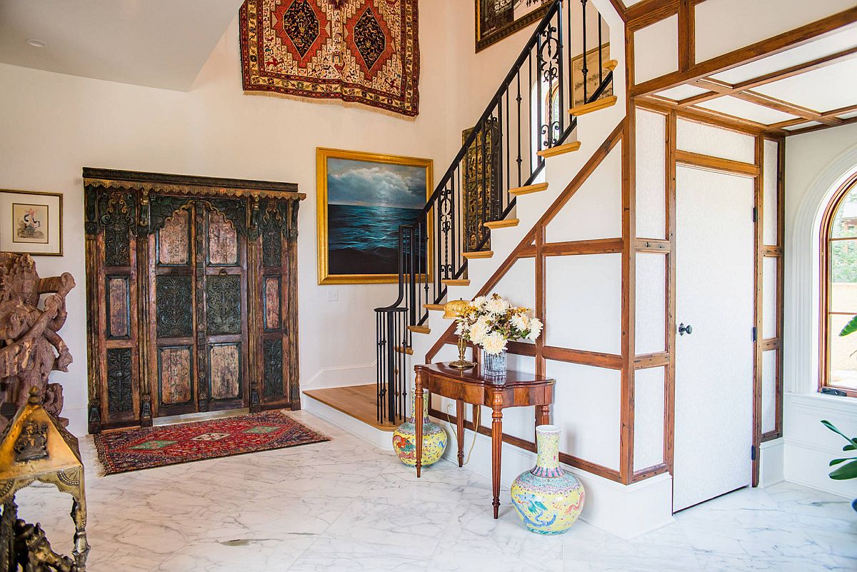 Eclectic-collection-of-exotic-decor-adds-color-and-intrigue-to-this-spacious-entry-with-white-marble-floor-73498