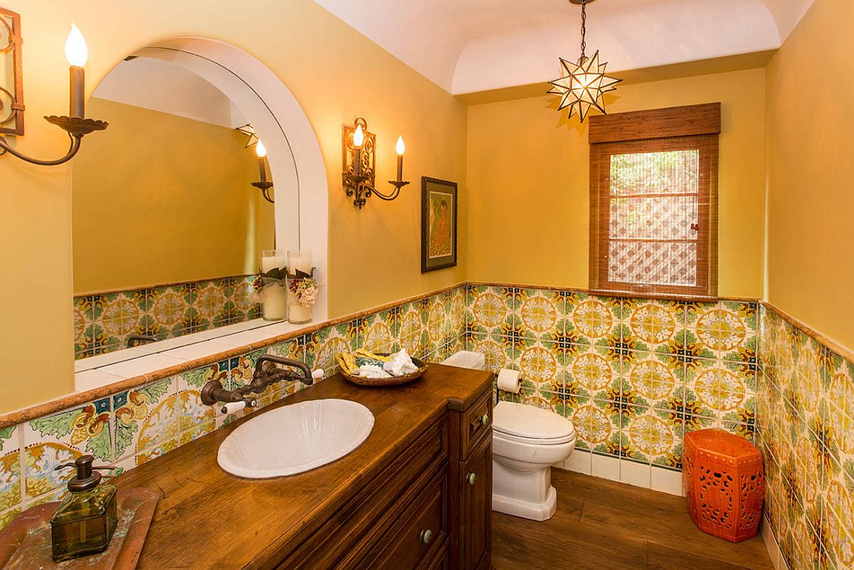 Fabulous Spanish revival style in the powder room with plenty of yellow