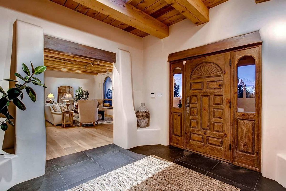 Gorgeous wood and white entry with southwestern and Mediterranean styles rolled into one