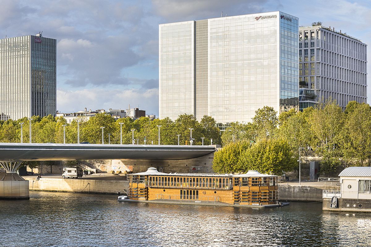 Innovative psychiatric hospital on teh edge of river offers fabulous natural views along with glimpses of Paris