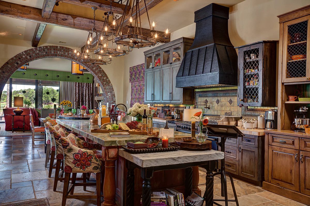 It is the island that steals the show in this classic kitchen with woodsy warmth