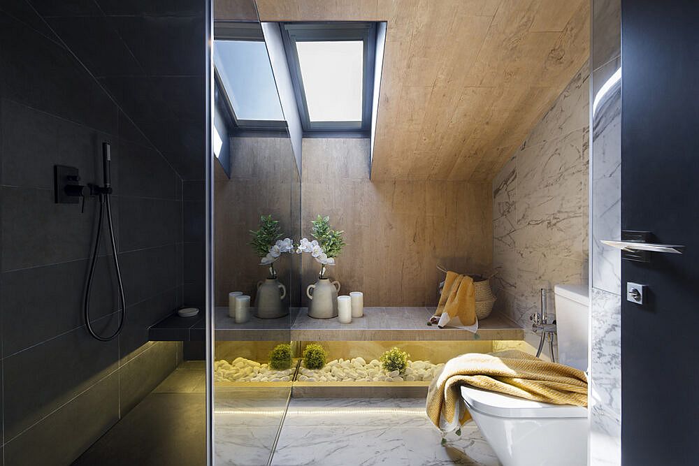 Luxurious attic level bathroom brings home the comforts of a spa