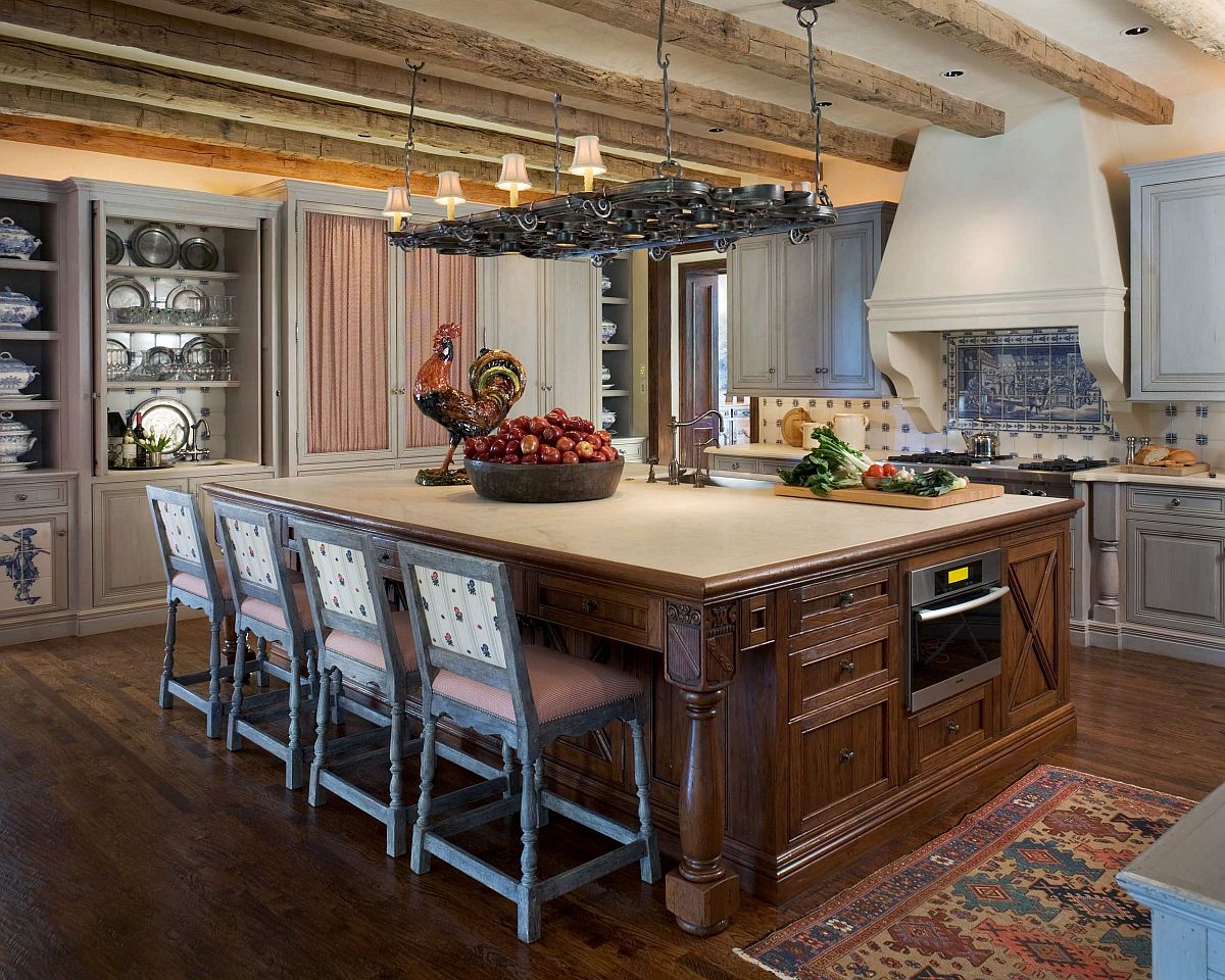 Mediterranean style kitchen with large island and slim wooden ceiling beams