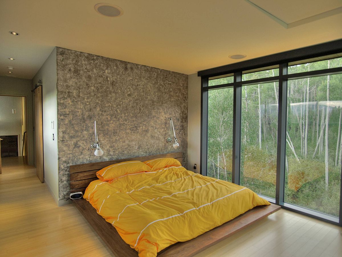 Minimal frame of the platform bed allows other features in the bedroom to shine through