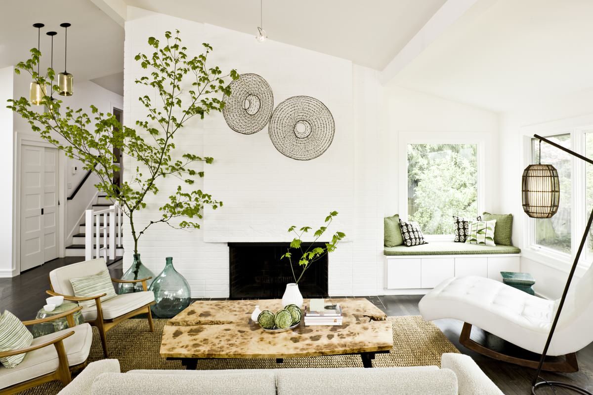 Nothing brings the small white living room alive like a splash of natural greenery